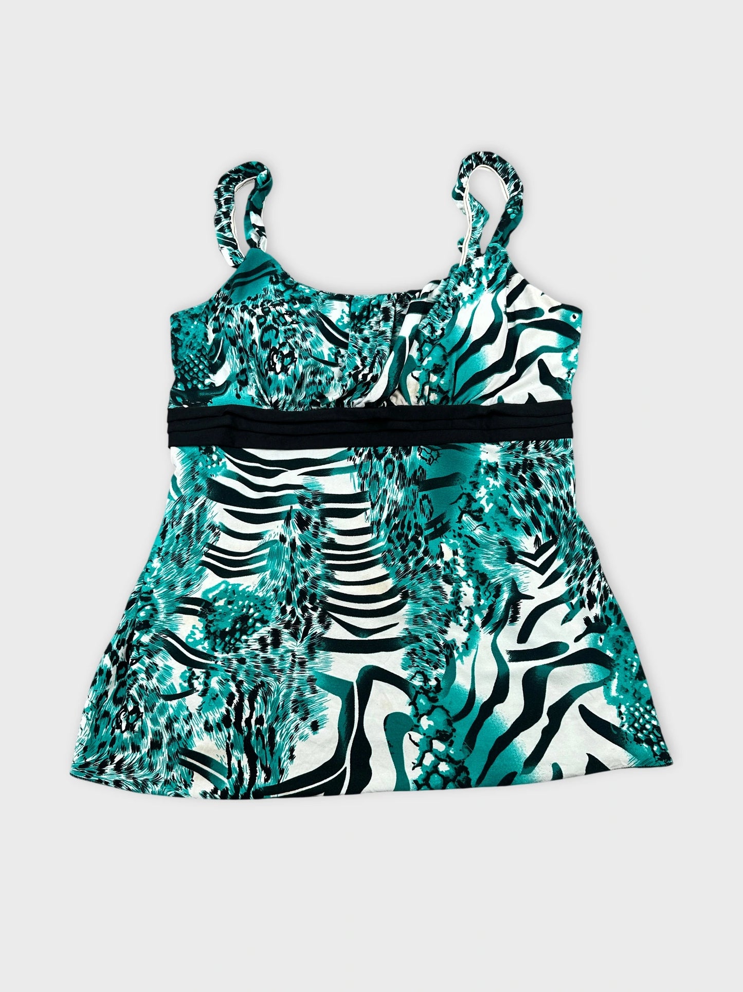 Front view of a sleeveless top in teal with animal print design.