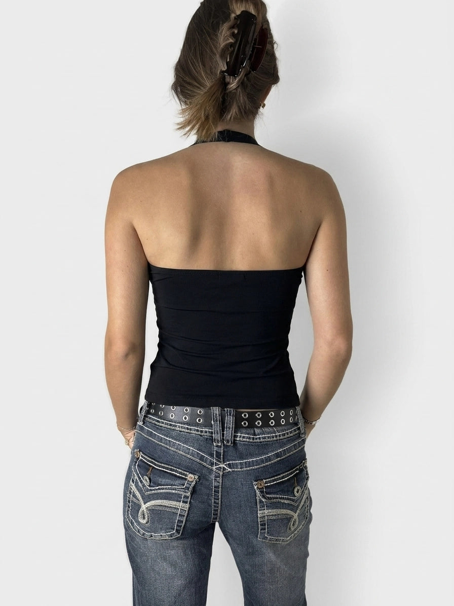 Back view of a black sleeveless top with a fitted shape.