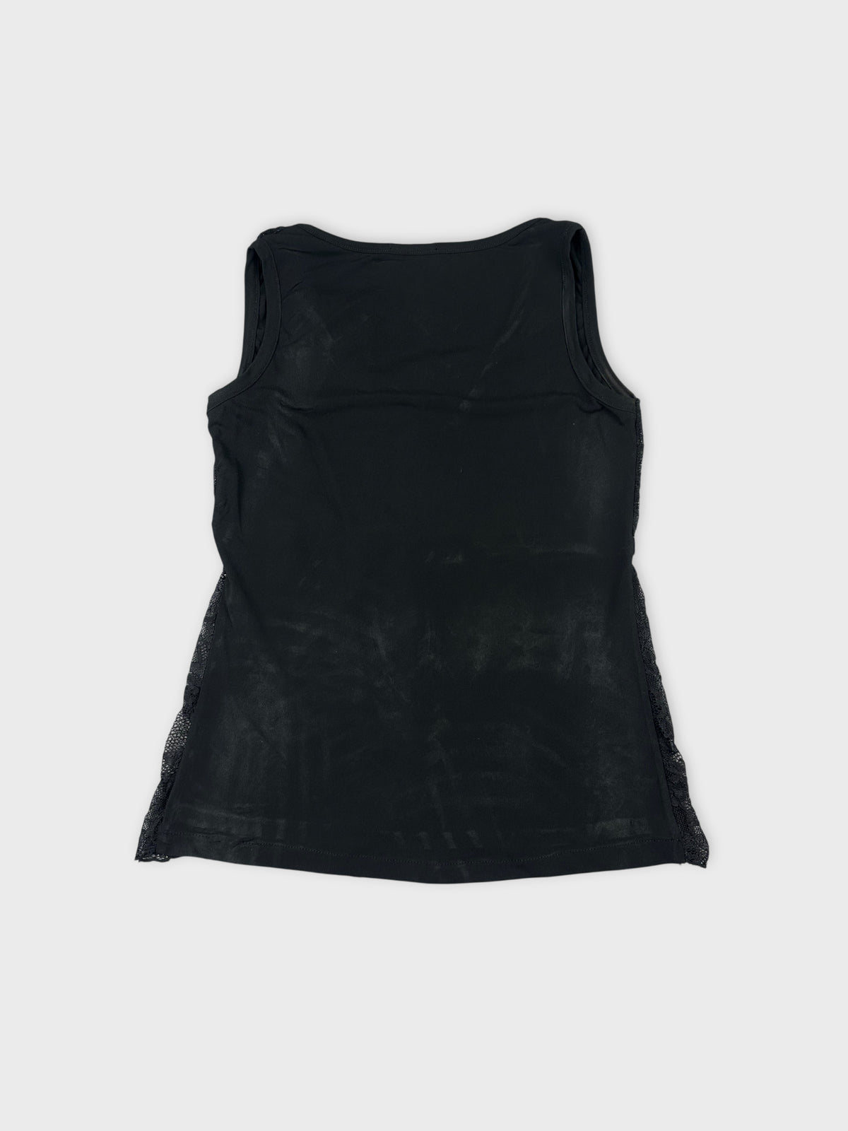 Black tank top with lace trim in back view.