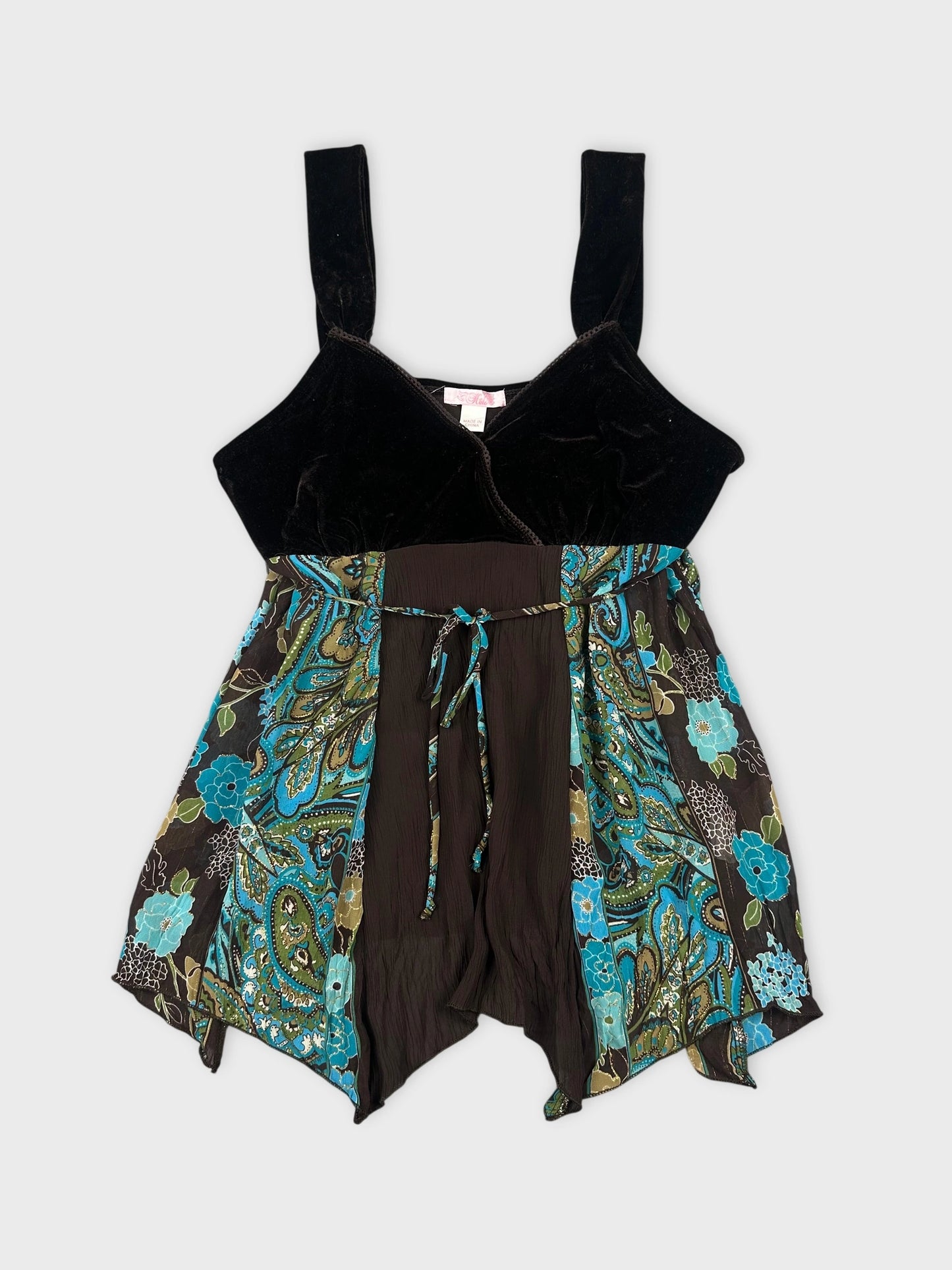 Front view of a black and paisley women upper body shorts with straps.