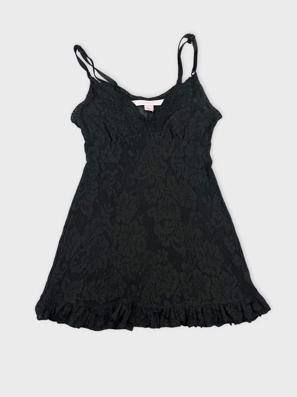 Black lace top with ruffled hem front view