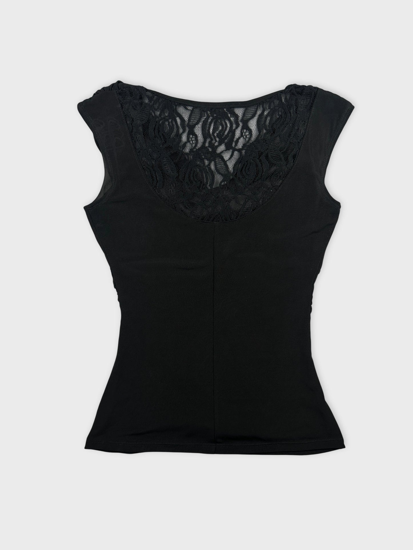 Back view of a black fitted top with lace detail at neckline.