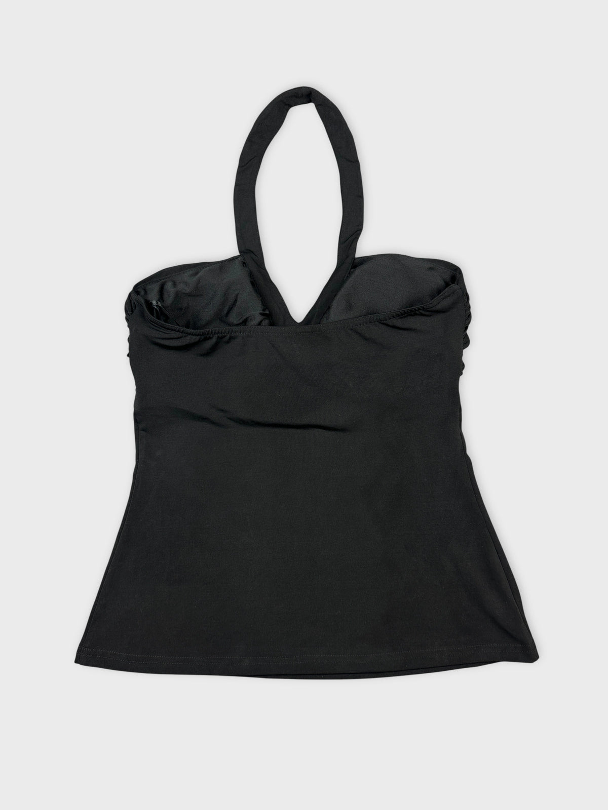 Back view of a black women's upper body top with halter straps.