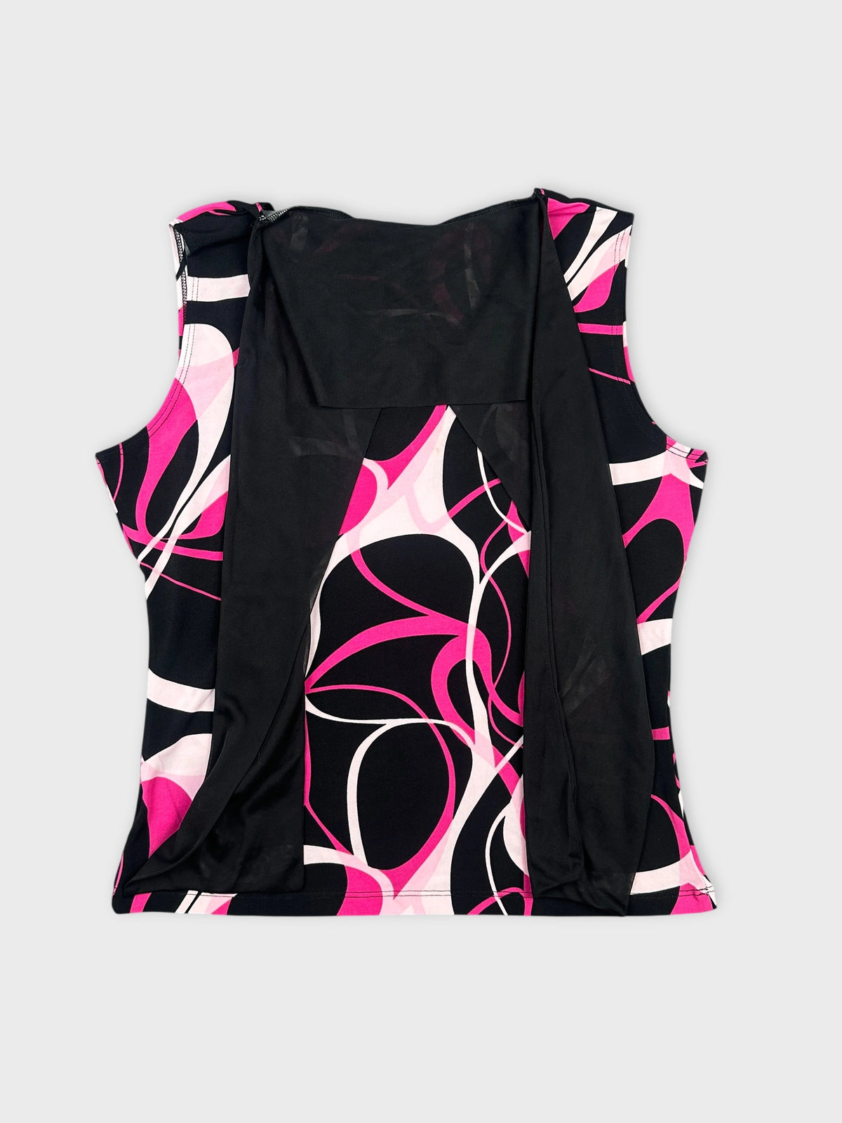 Back view of a sleeveless top featuring pink and black abstract patterns.