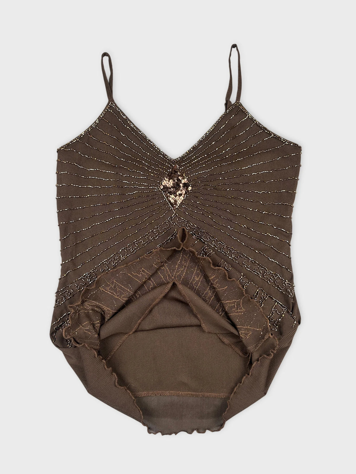 detail view of a brown women's top featuring sequined design and spaghetti straps.