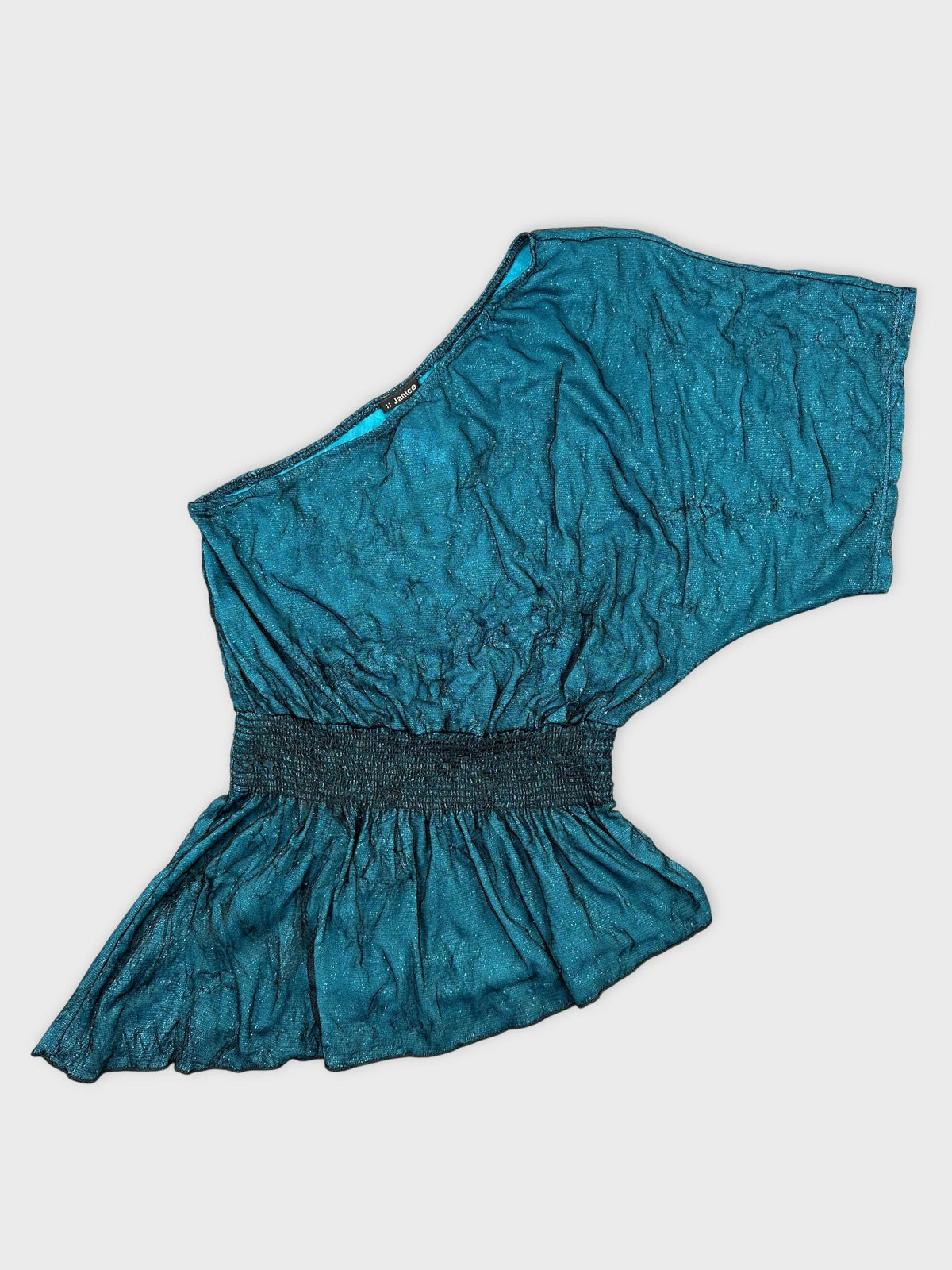 Front view of a teal one-shoulder top with a gathered waist.