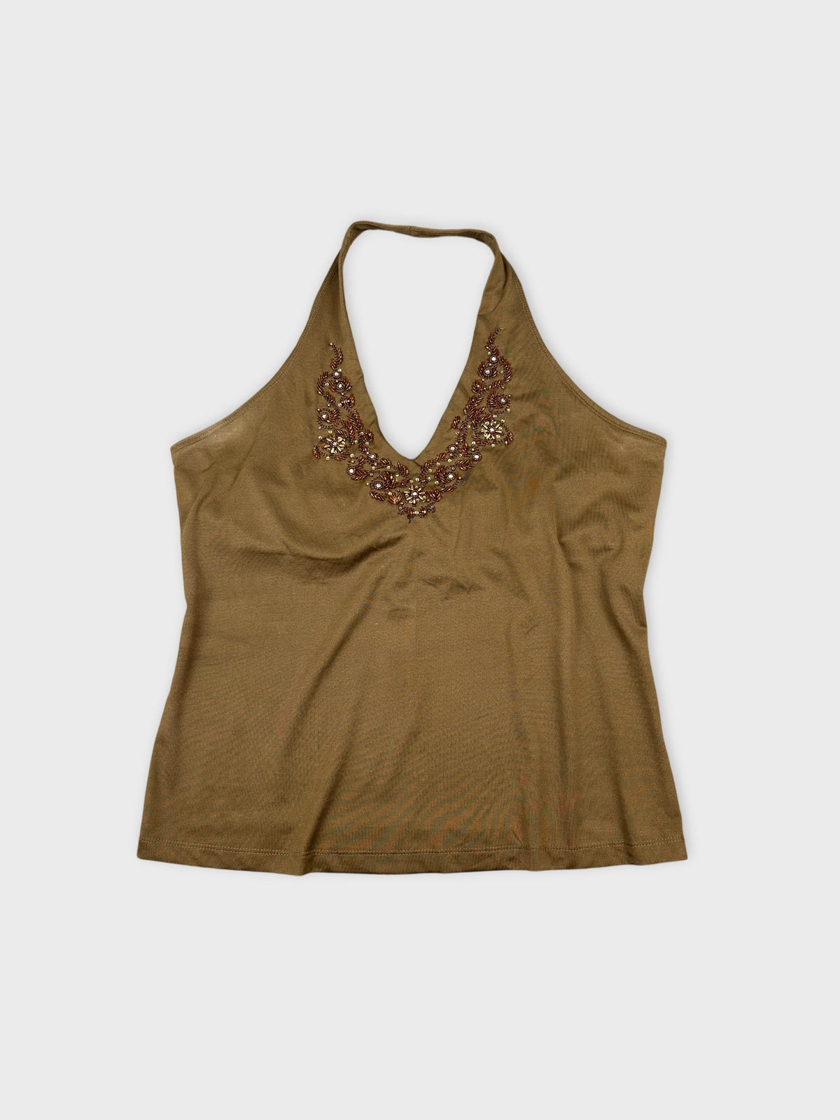 Front view of a brown halter top with embroidered neckline detail.
