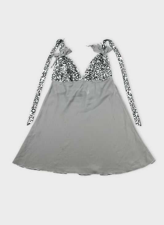 Front view of a gray top with leopard print detail on straps.