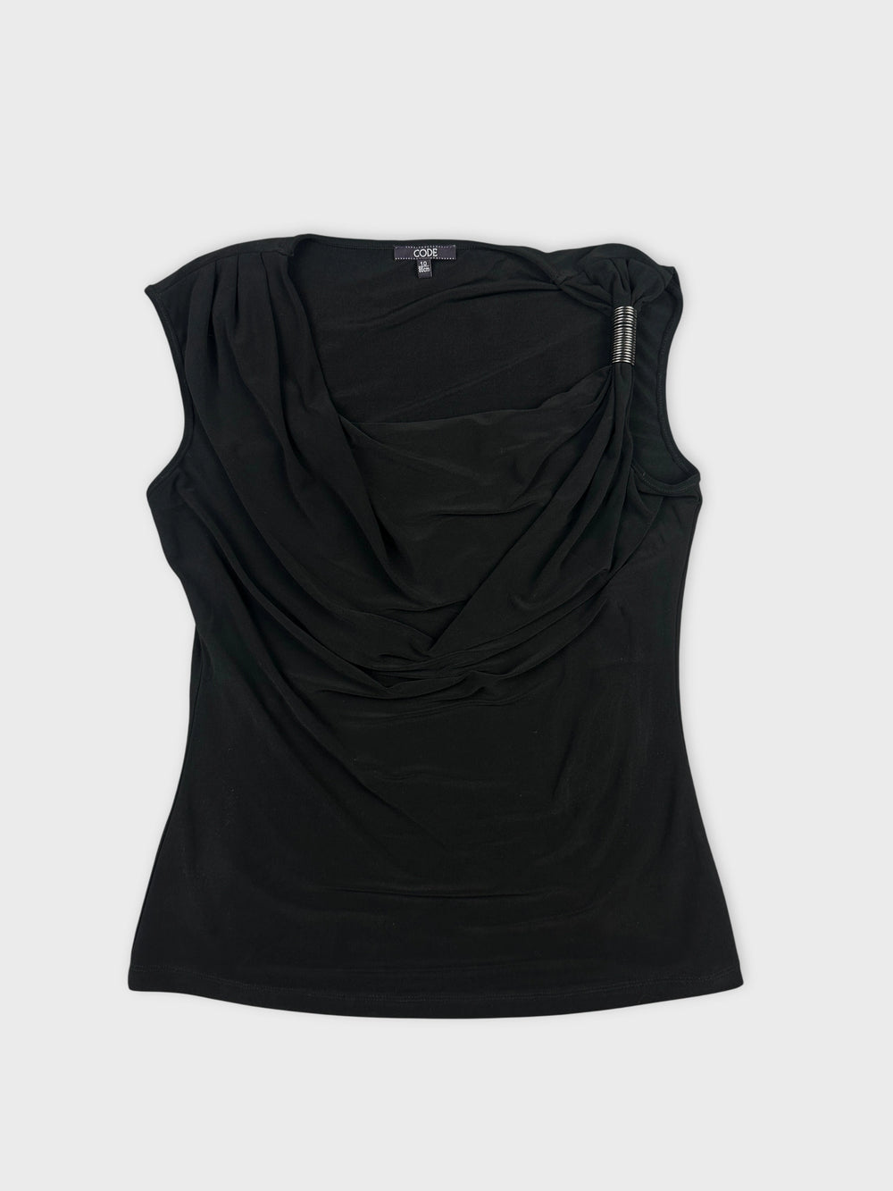 Front view of a black draped women's top with detailed neckline.