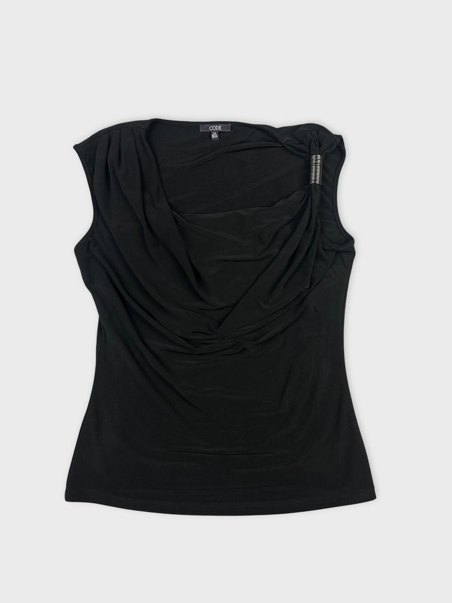 Front view of a black draped women's top with detailed neckline.