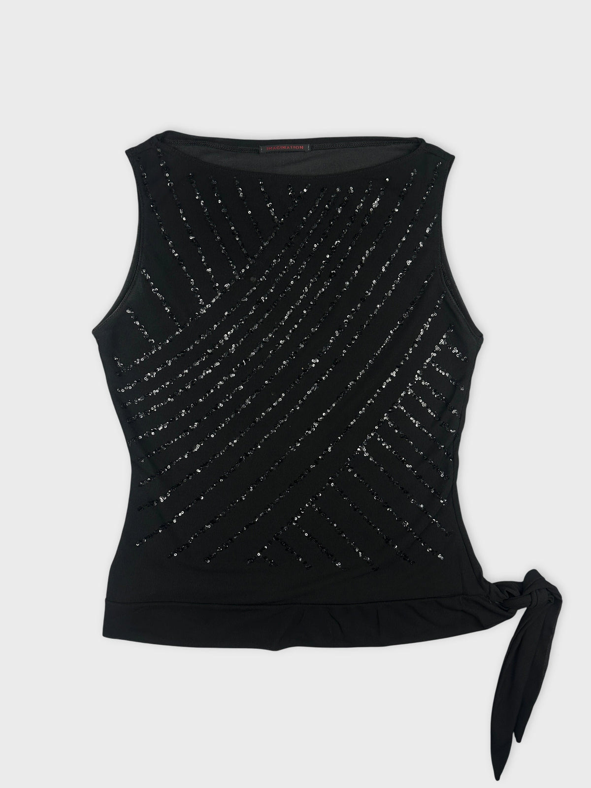 Front view of a black tank top with diagonal sequin detailing and side tie.