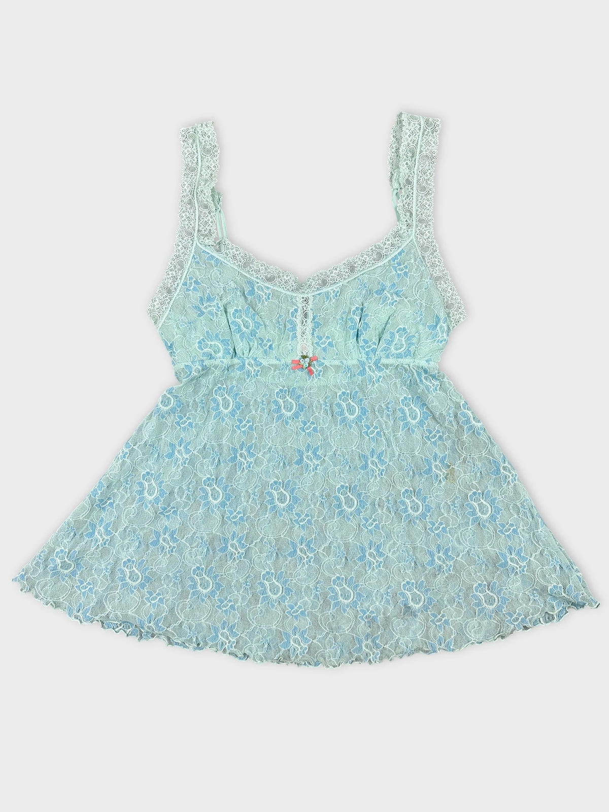 Light blue lace top with floral pattern front view