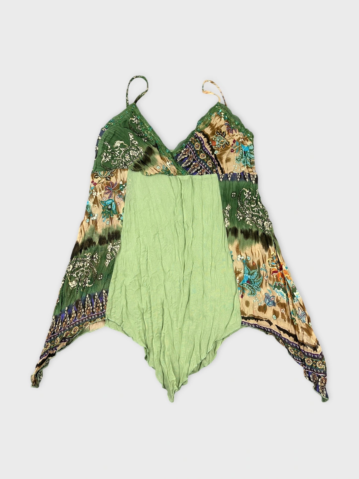Front view of a green vintage top featuring a floral pattern.