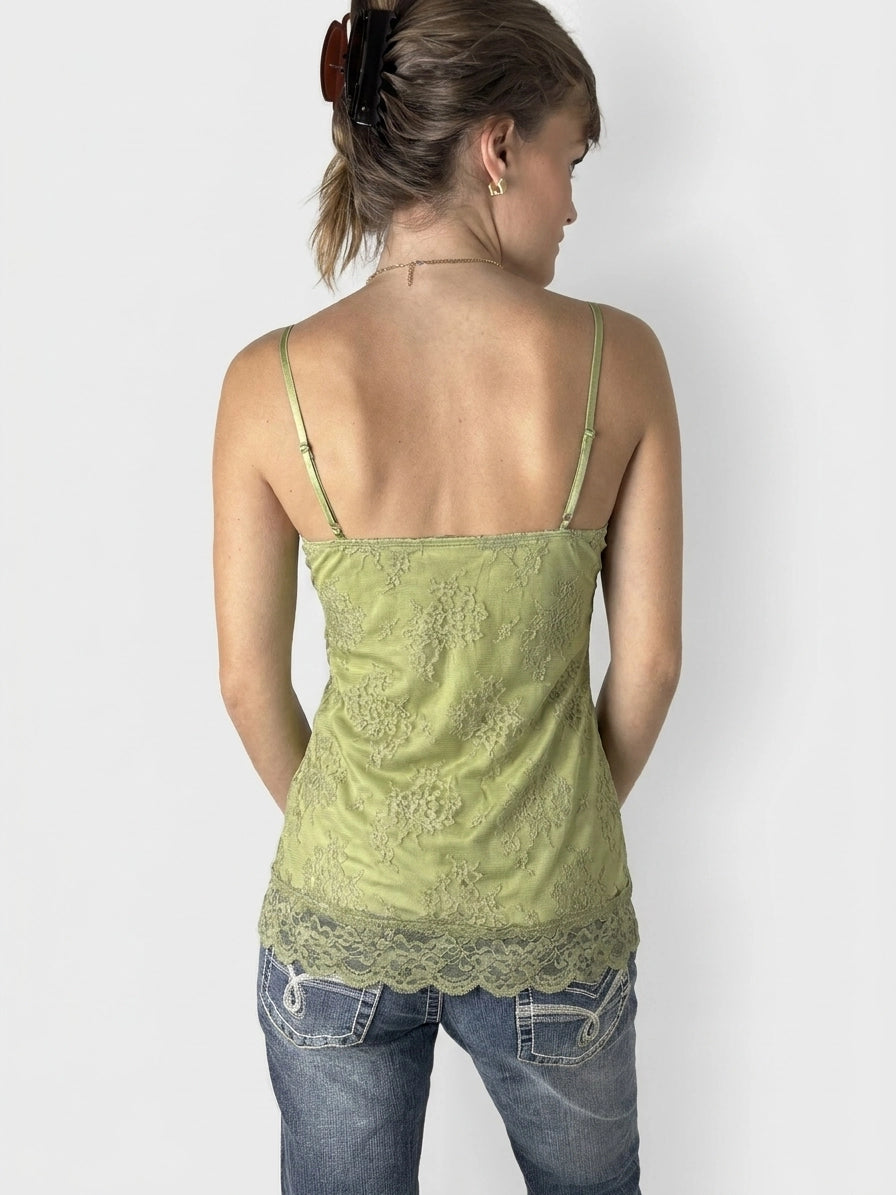 Back view of a green camisole top with lace trim.