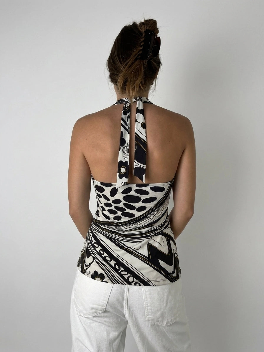 Back view of a halter-top featuring a black and white abstract pattern.