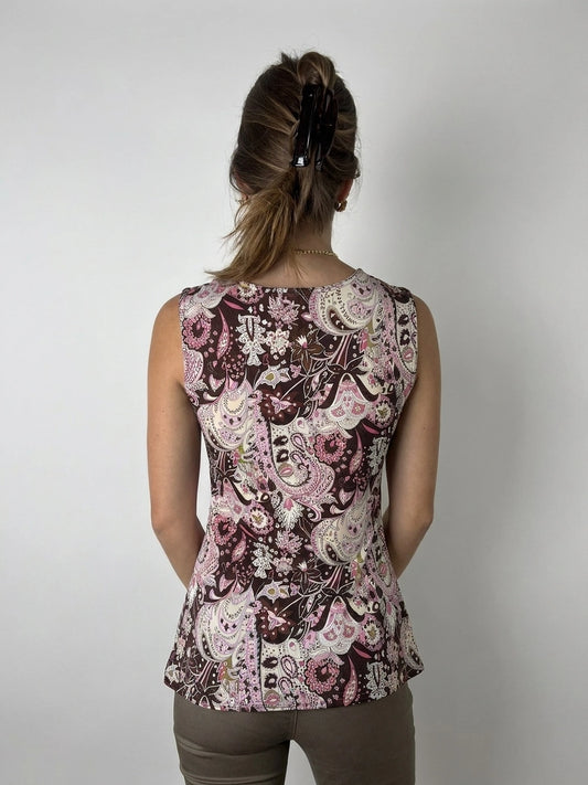 Back view of a sleeveless top in dark brown with paisley pattern.