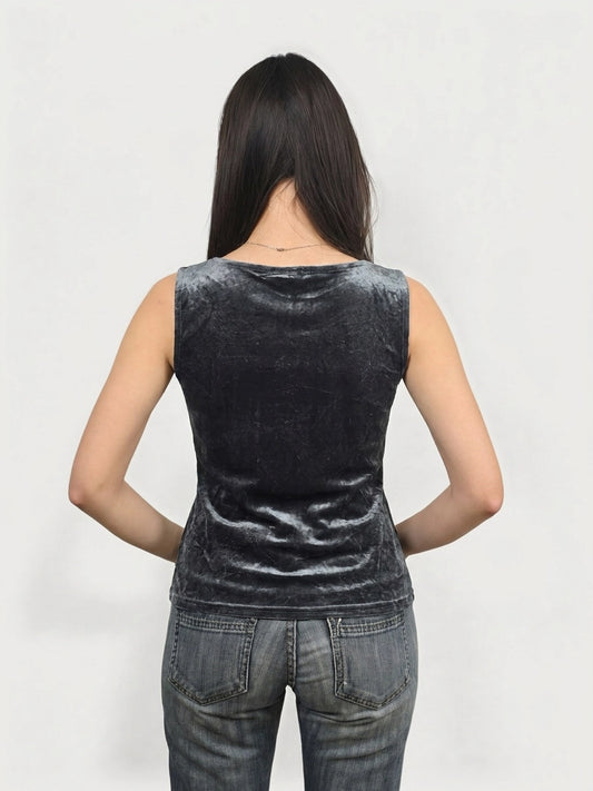 Back view of a black velvet sleeveless top featuring a smooth texture.