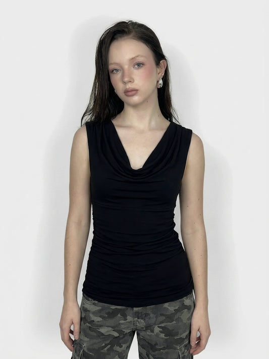 Black sleeveless top with draped neckline, front view.