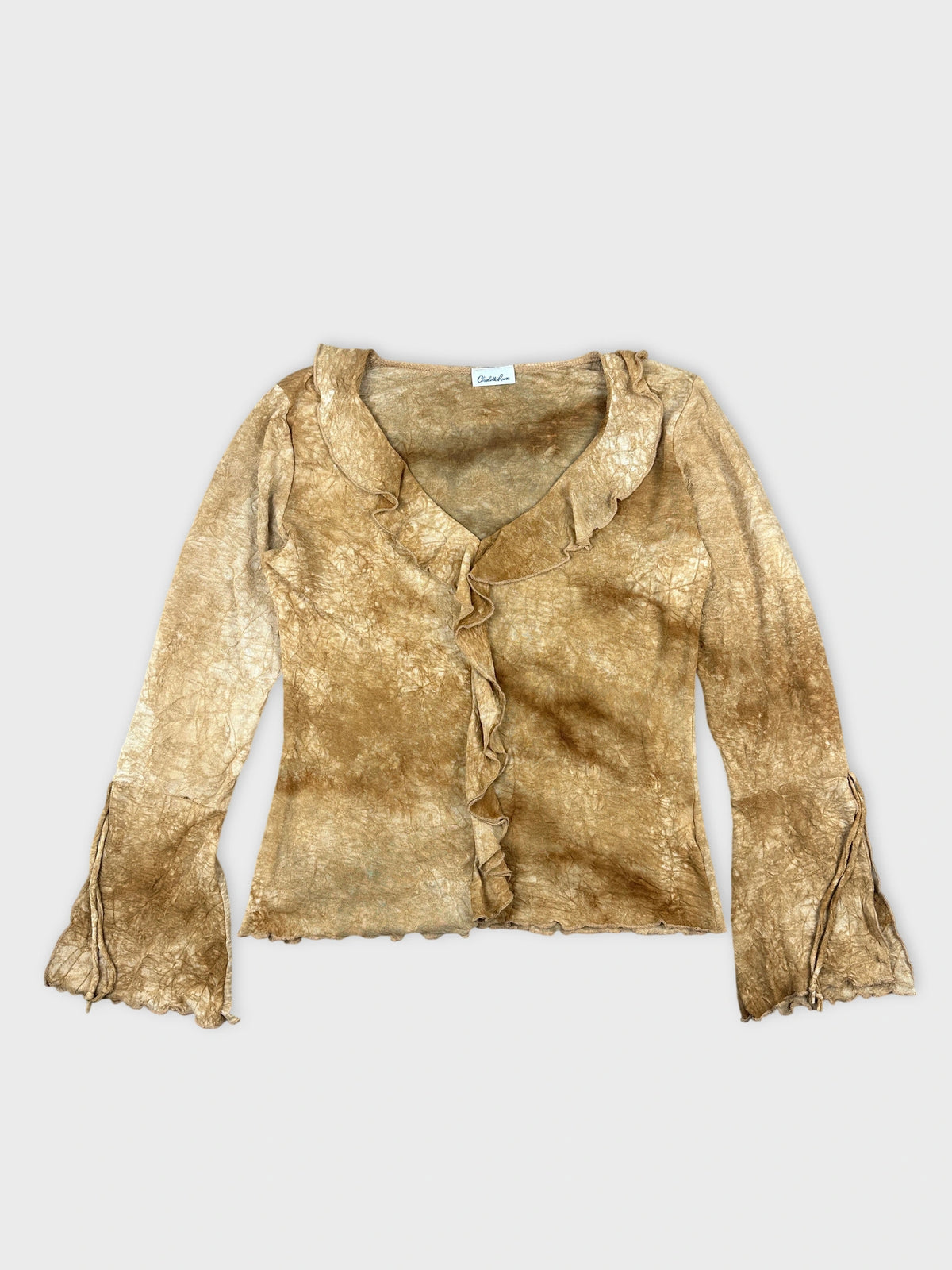 Front view of a vintage long sleeve top in golden beige with ruffled trim.