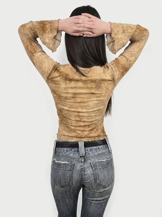 Back view of a long sleeve, brown top with flared sleeves.