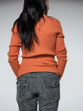 orange v neck jumper