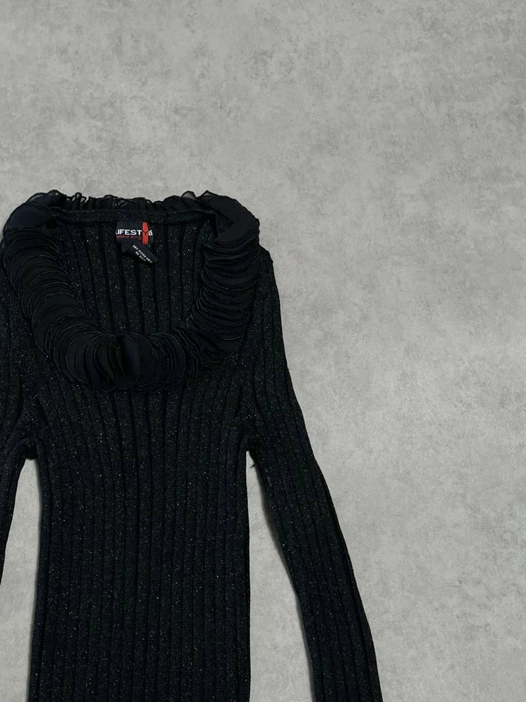 black jumper with decorated neck