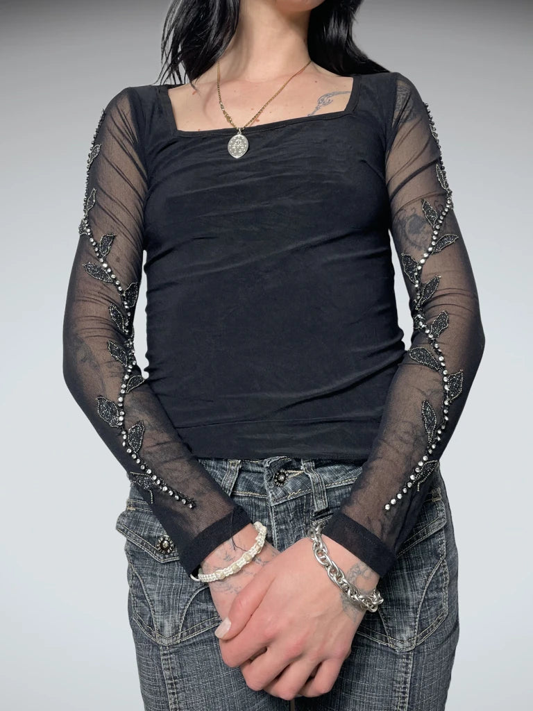top with gems decoration on the sleeves