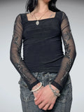 top with gems decoration on the sleeves