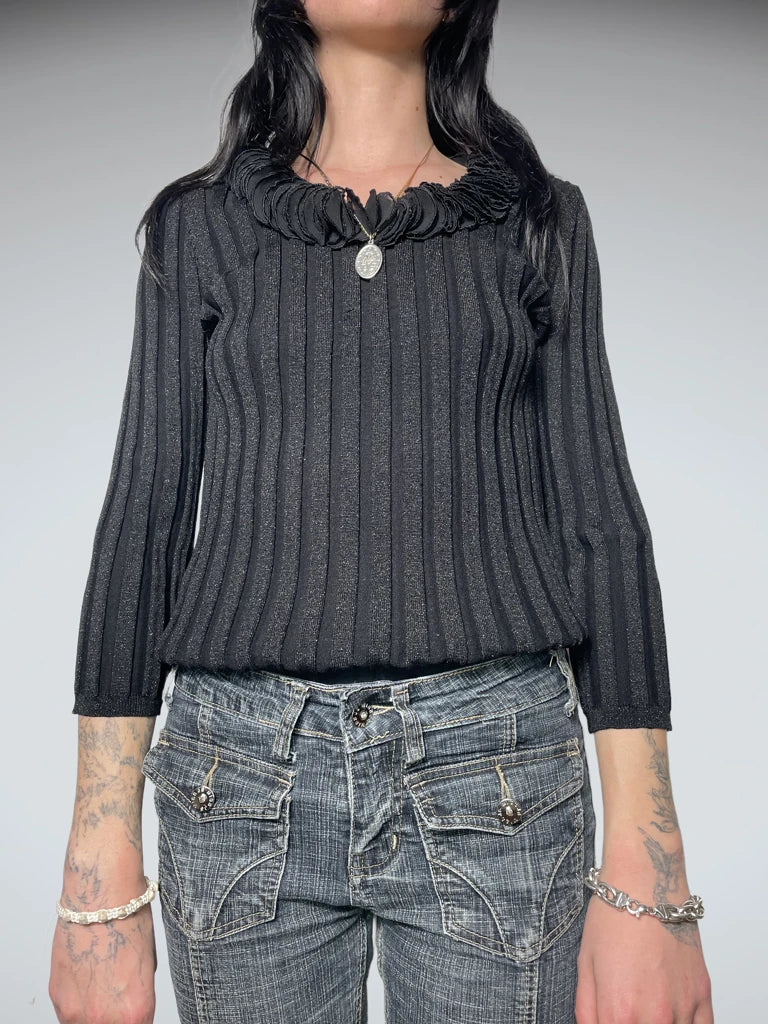 black jumper with decorated neck