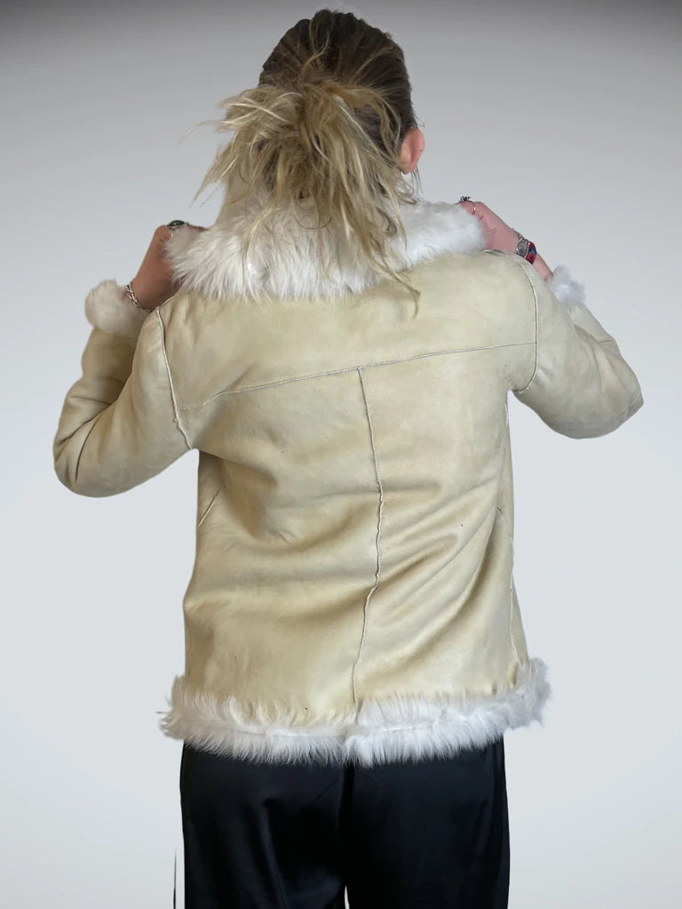 Leather jacket with faux fur