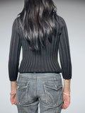 black jumper with decorated neck