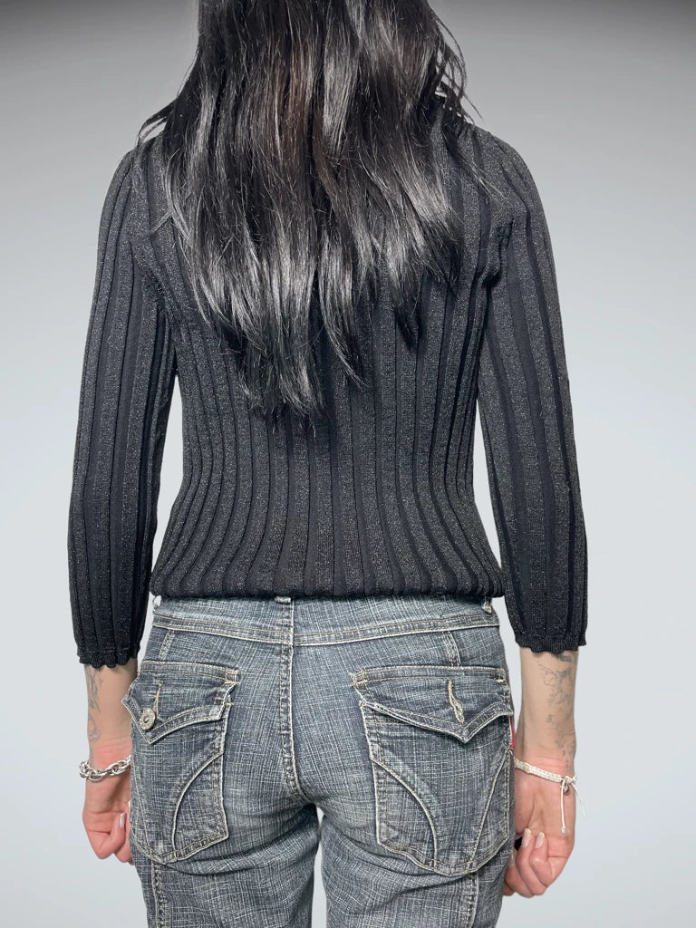 black jumper with decorated neck