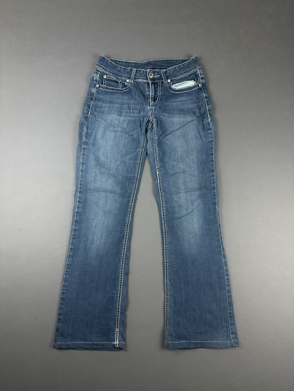Stylish Denim Jeans with Unique Back Pocket Detail (W28)