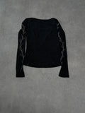 top with gems decoration on the sleeves