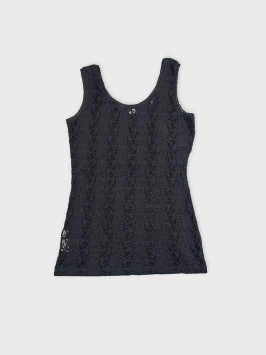 Back view of a black lace top featuring intricate lace detailing.