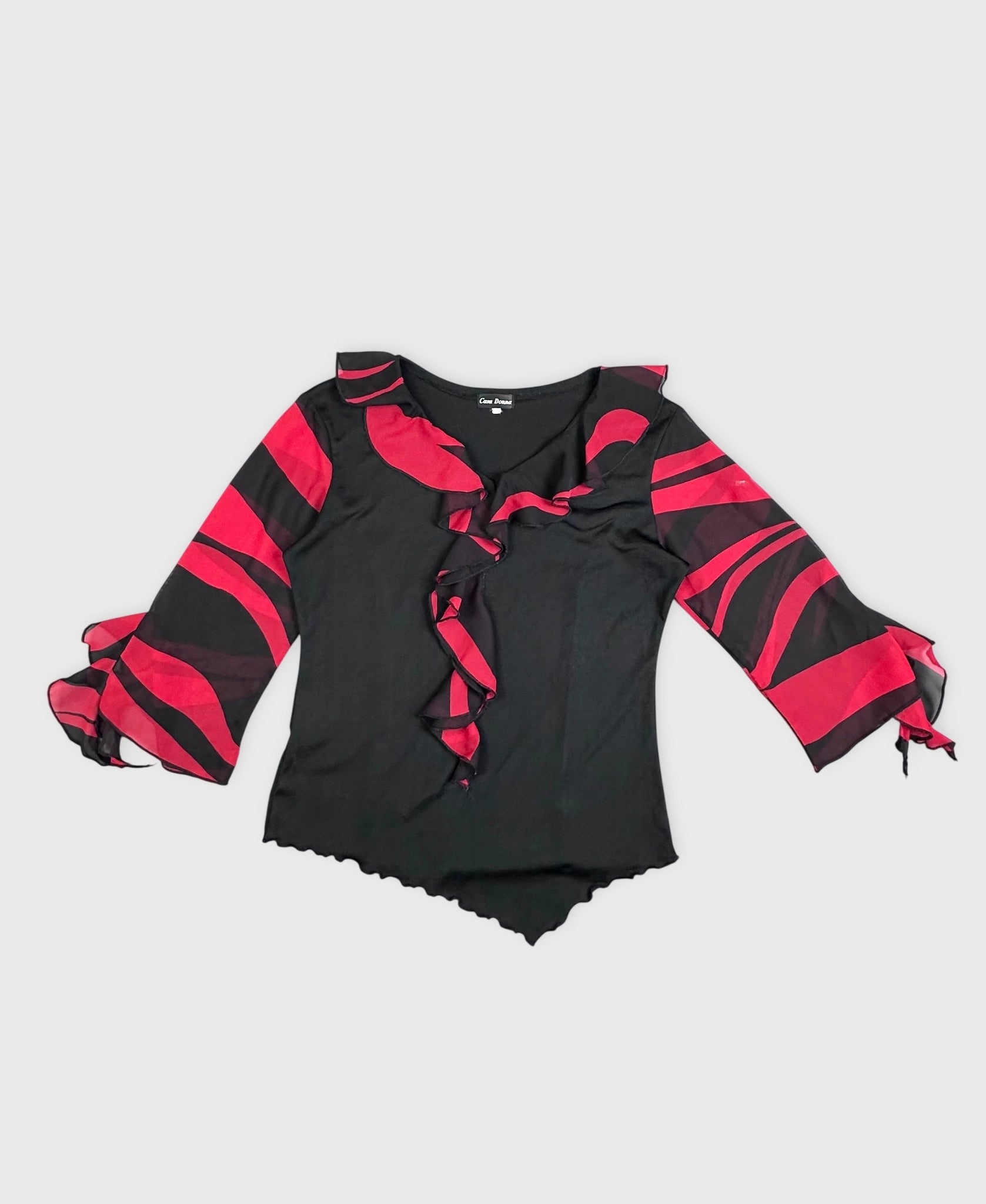 Front view of a black and red striped top with ruffled trim.