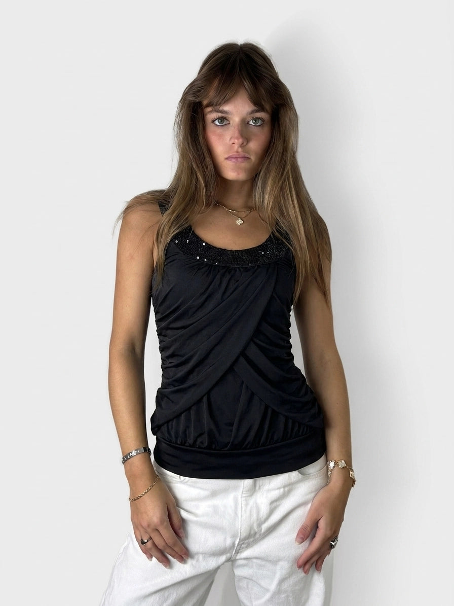 Black ruched tank top with sparkly detail, front view.