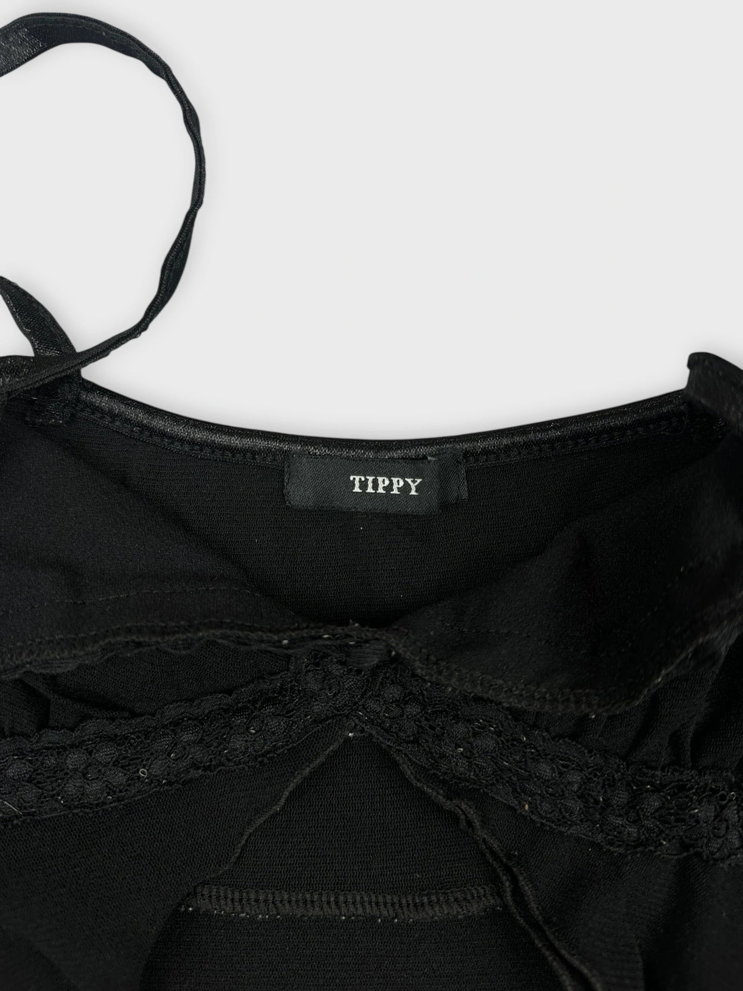 Black sheer cami top with lace trim detail view