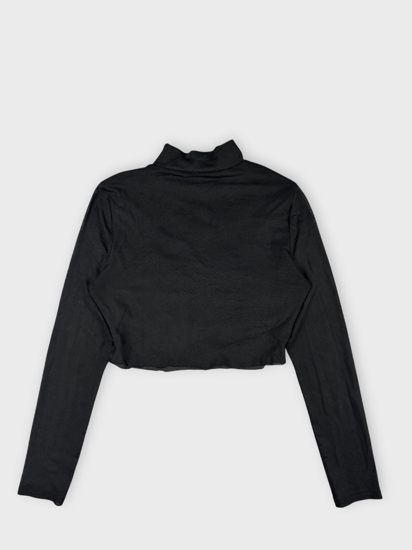 Back view of a black sheer crop top featuring long sleeves and high collar.