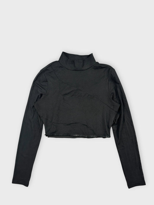 Black sheer crop top in front view featuring unique cutouts and long sleeves.