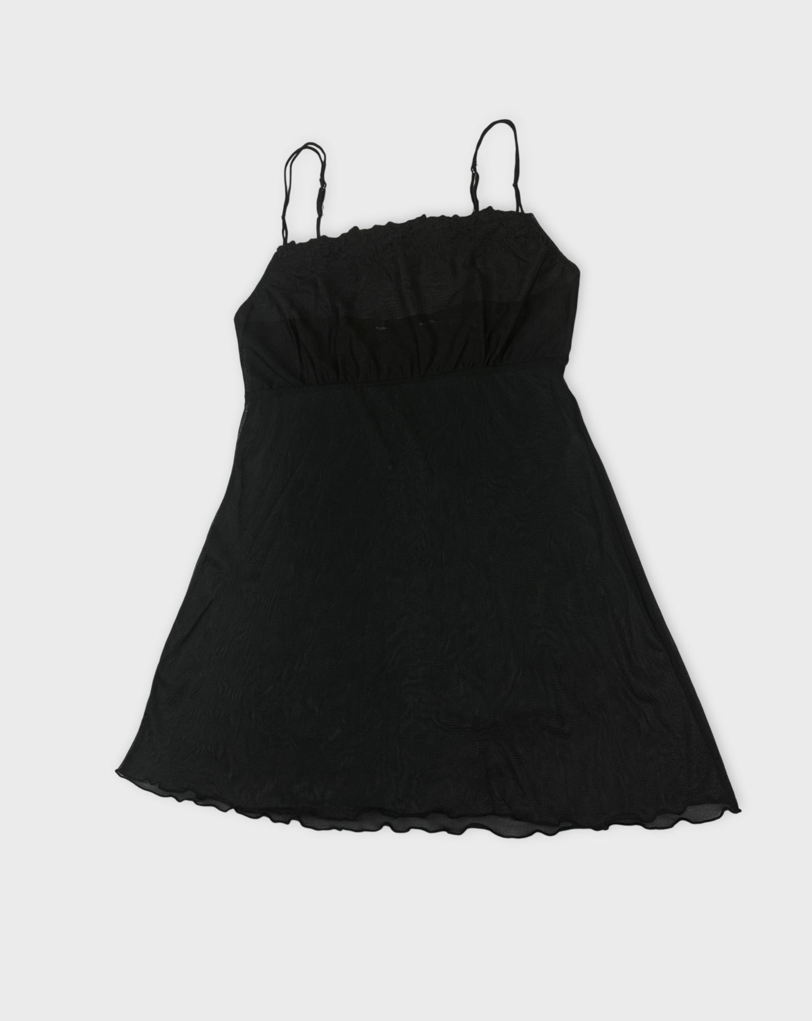 Black sheer slip dress with spaghetti straps front view featuring a relaxed fit.