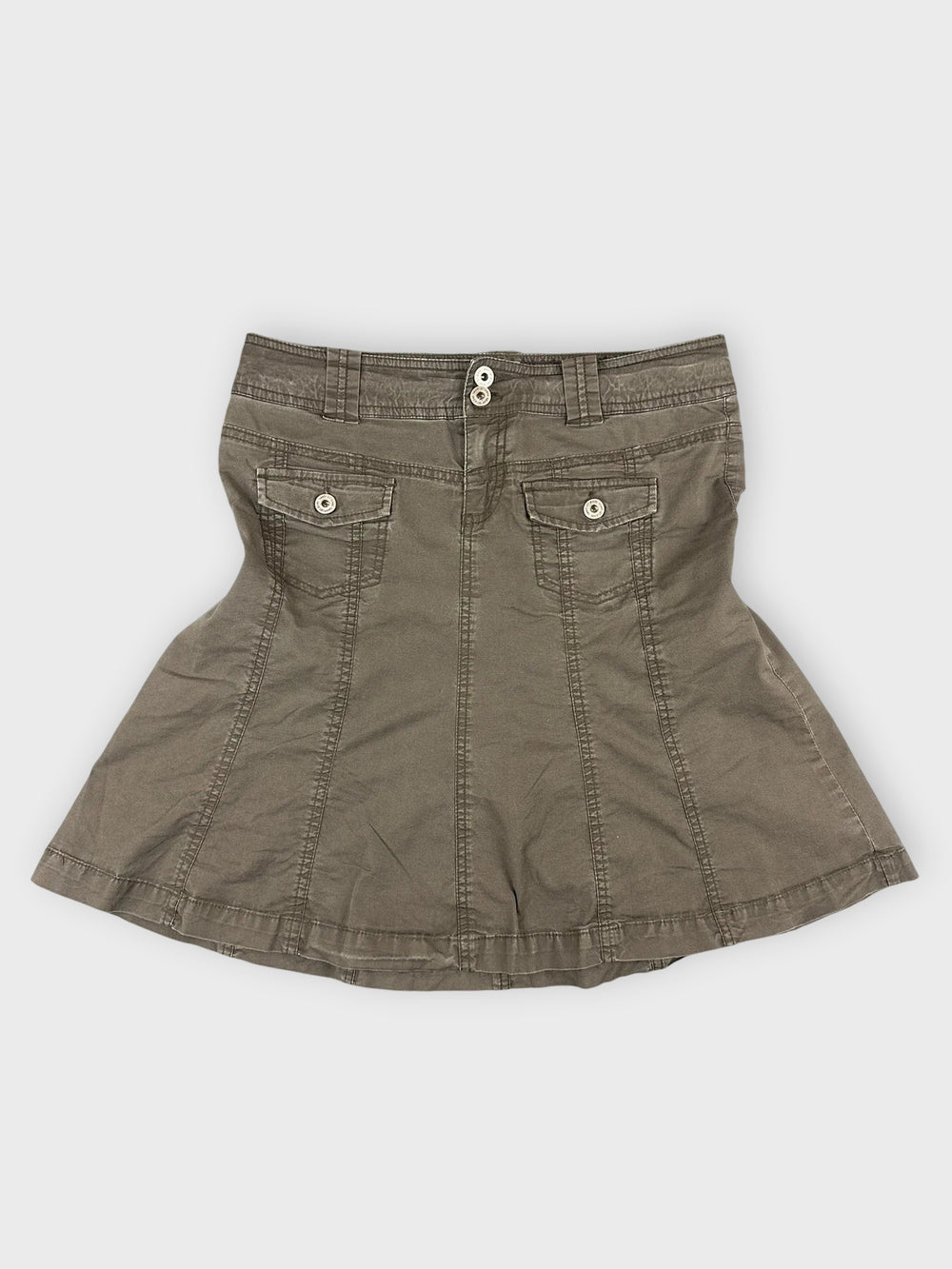 Brown cotton mini skirt with pockets and button detail front view.