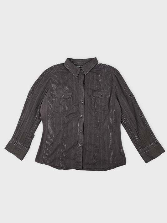 Front view of a brown button-up shirt featuring a subtle striped pattern.