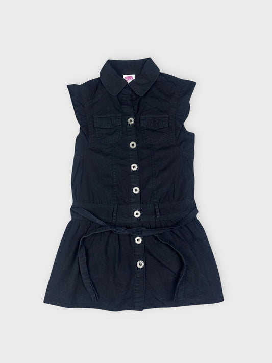 Front view of a black button-down top with puff sleeves and waist tie.
