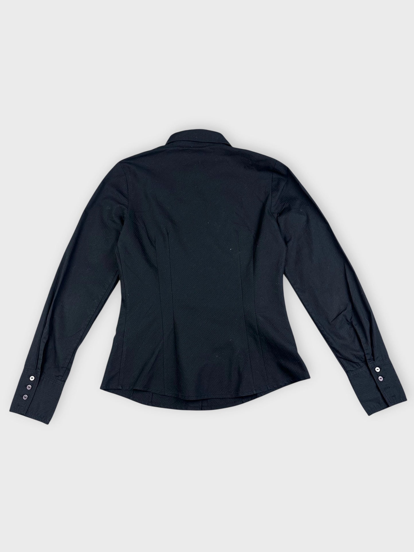 Chic black button-up shirt with tailored fit back view showing smooth fabric and structured seams.