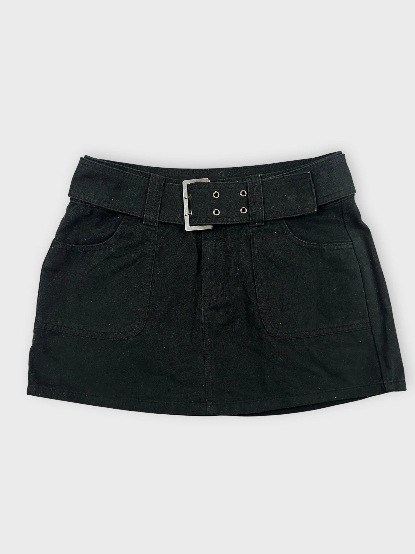 Chic black mini skirt with adjustable belt front view showing pocket details