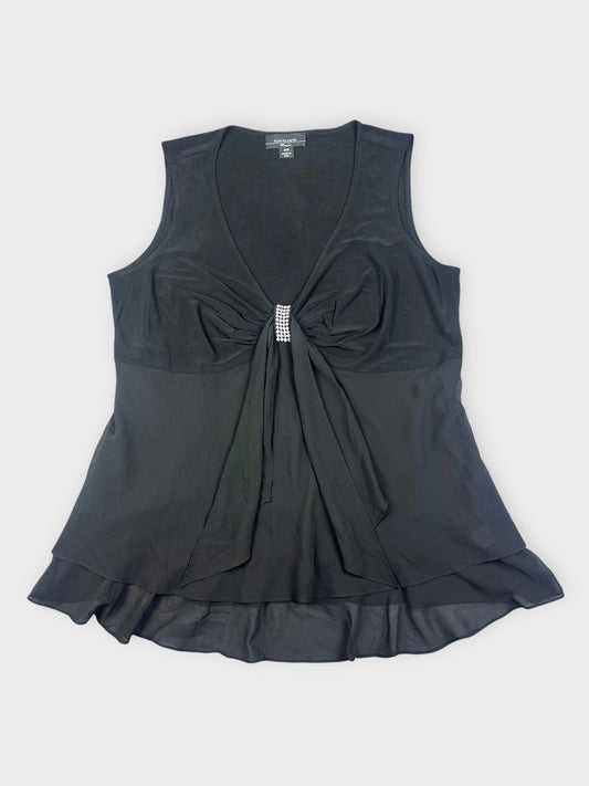 Chic black top with a jewel detail front view