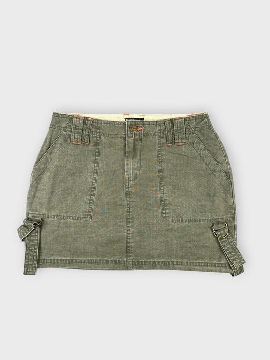 Chic olive mini skirt with unique side straps front view