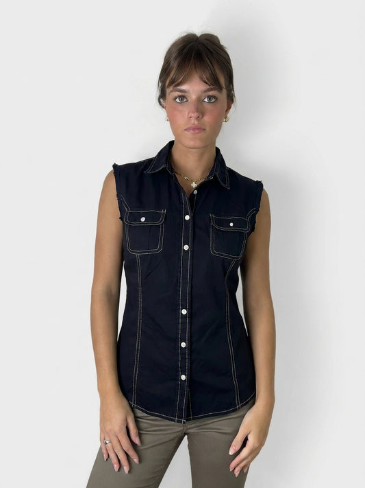 Classic denim button-up shirt in black with white stitching, front view.
