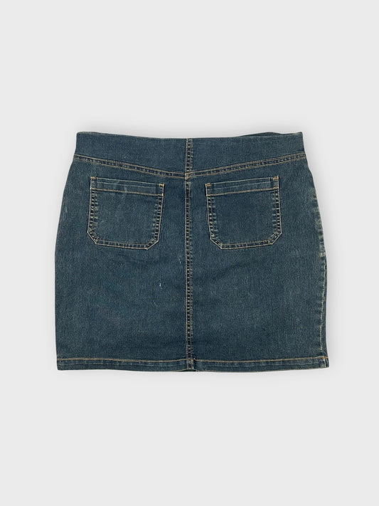 Denim mini skirt back view with two pockets and a belted detail.